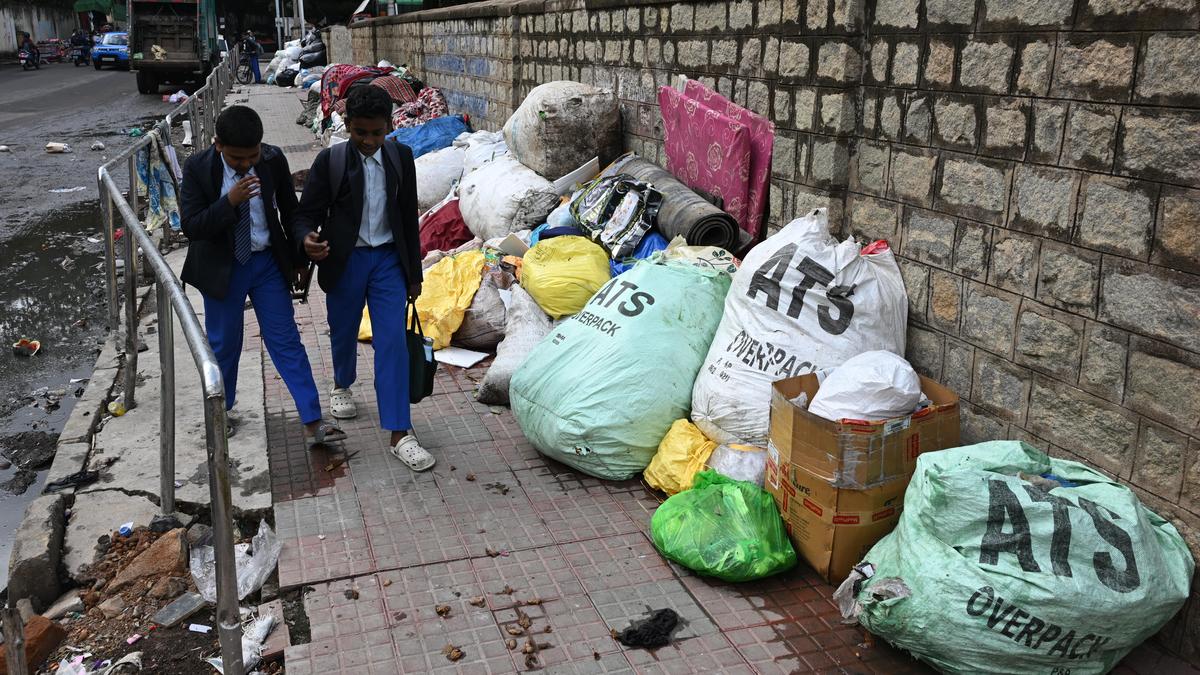 Community cleanup drive clears garbage dump near J.C. Nagar school