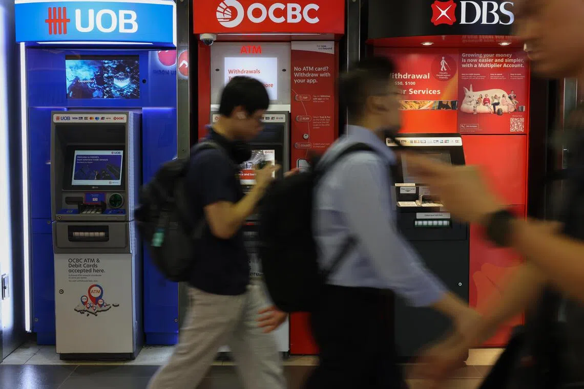 UOB shares gain on Fed rate hike expectations; yen softens
