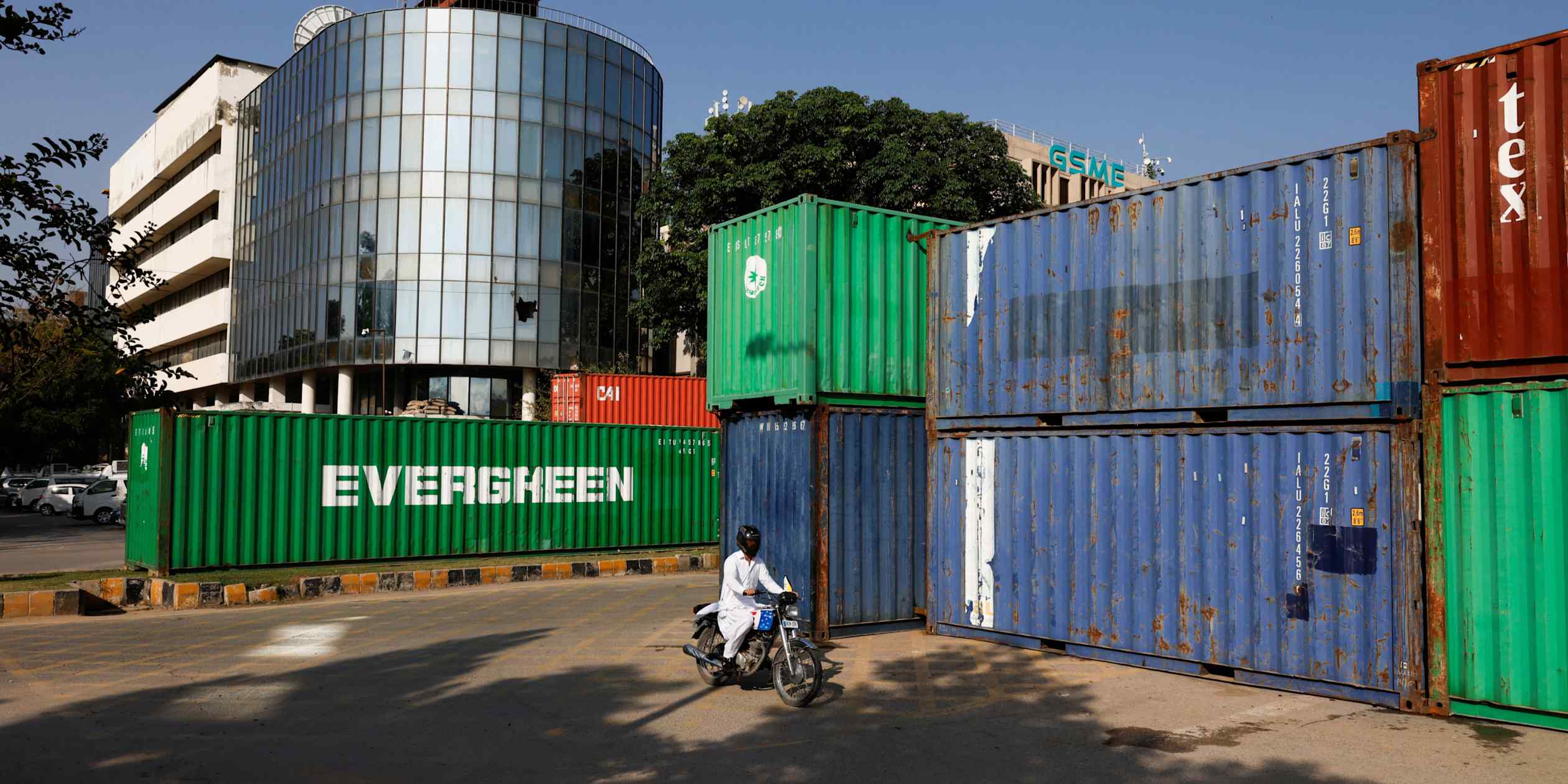 Pakistan erects security barriers in capital ahead of Khan rally