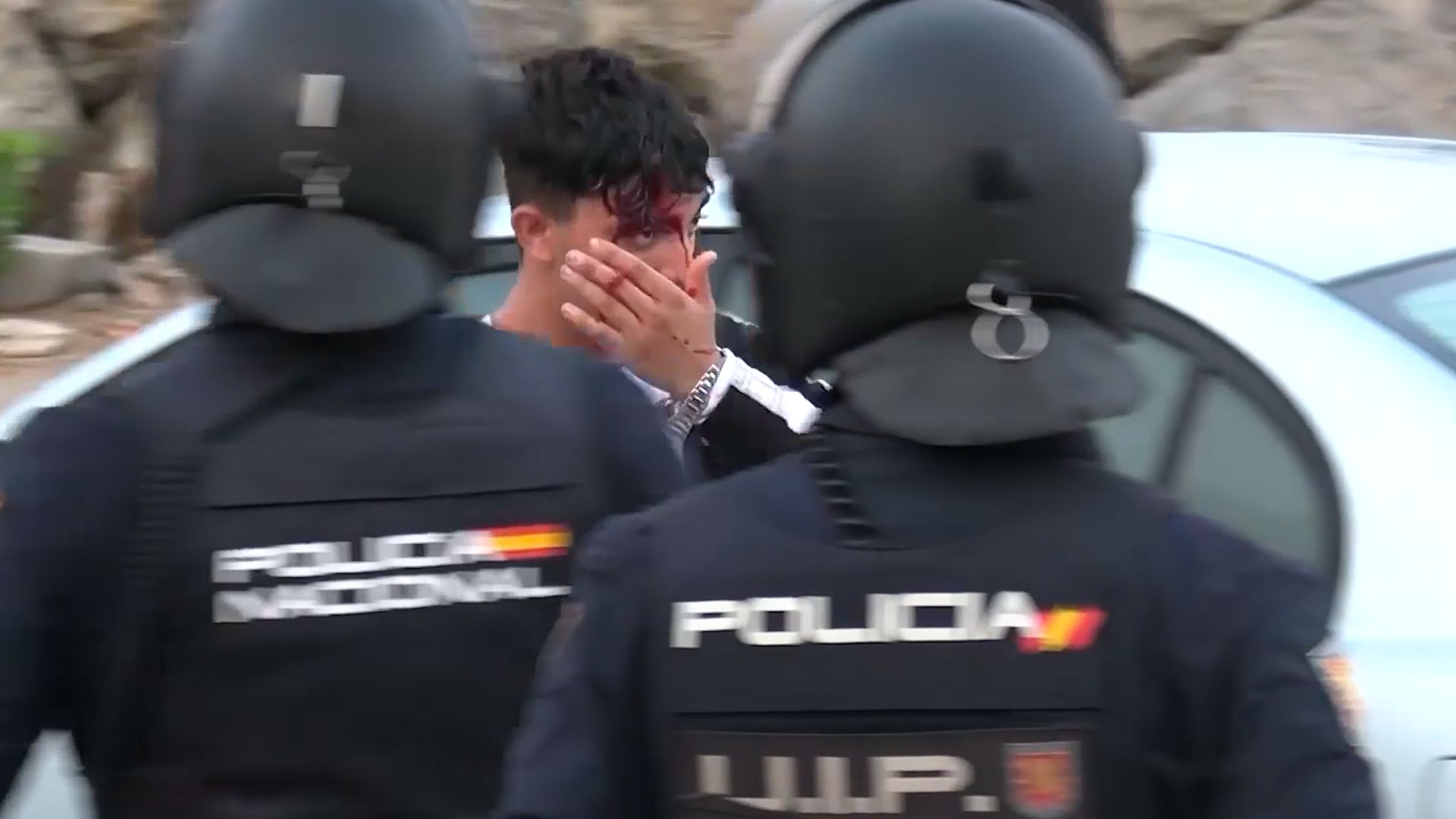 Police use force during migrant relocation at Spanish enclave