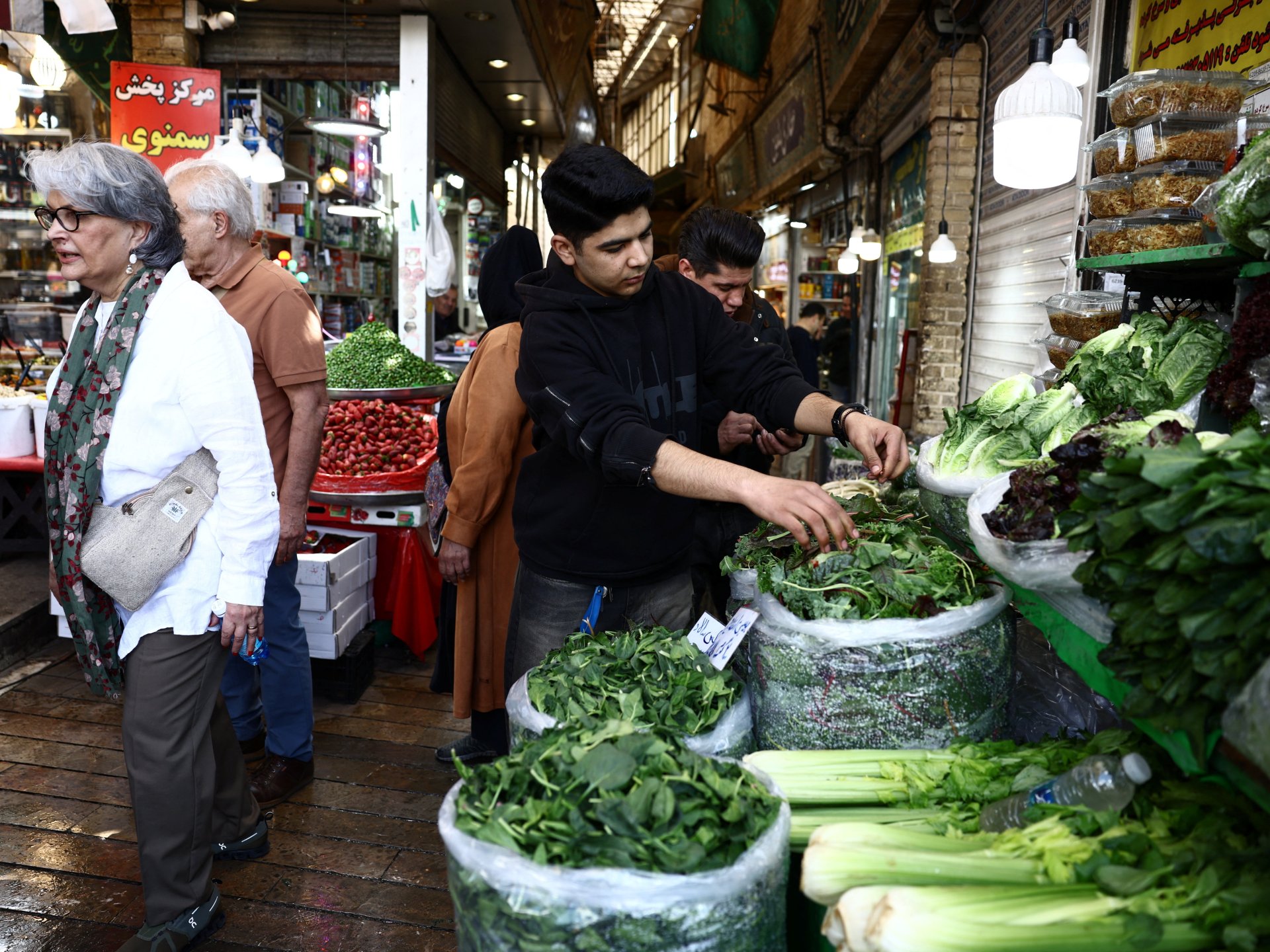 Iranian civilians face mounting pressures halfway through regional conflict