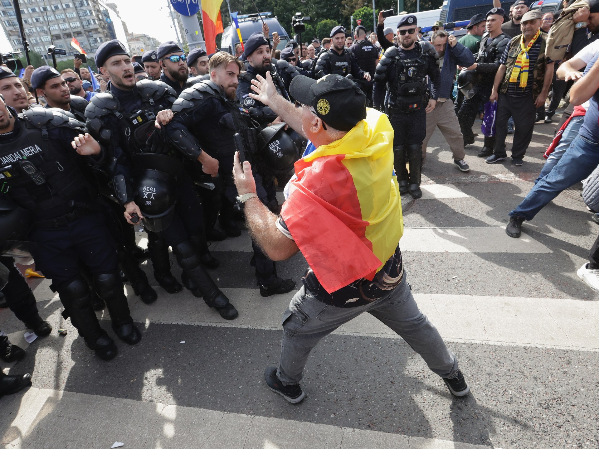 Romanian farmers clash with police over livestock export restrictions