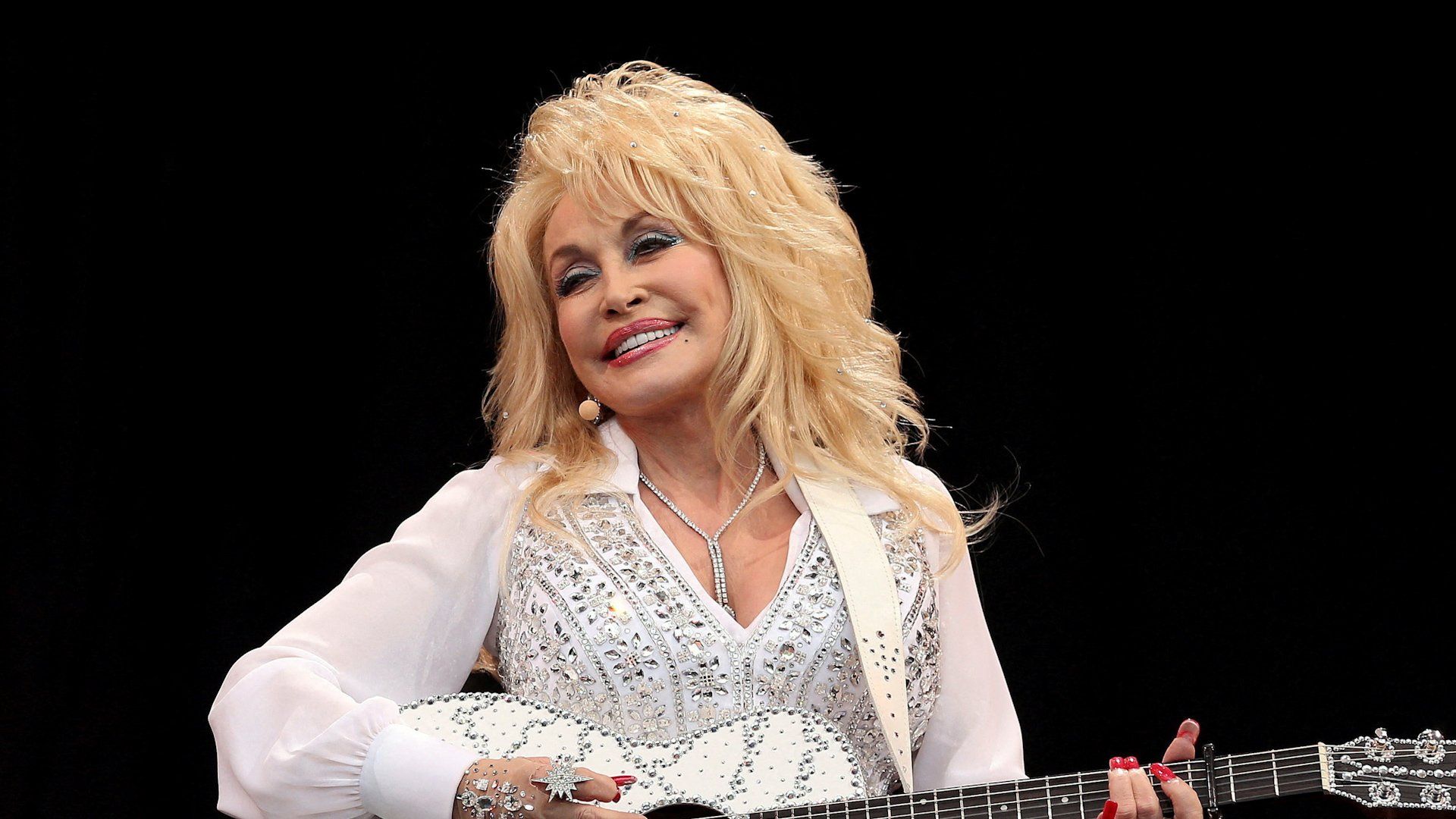 Country music icon Dolly Parton dies at 80