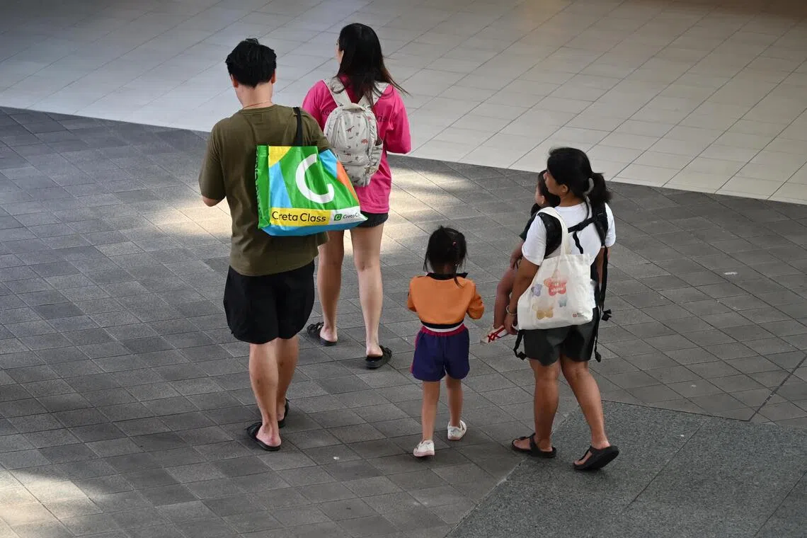 Singapore's revamped childcare leave scheme faces months-long rollout timeline