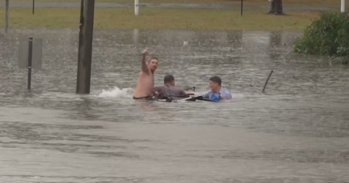 Australian TV journalist describes harrowing rescue of flood-trapped motorist