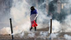 Macron warns against political exploitation of French civil unrest