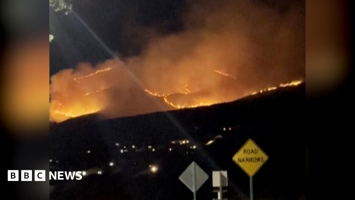 Tens of thousands evacuate as wildfire spreads near Reno, Nevada
