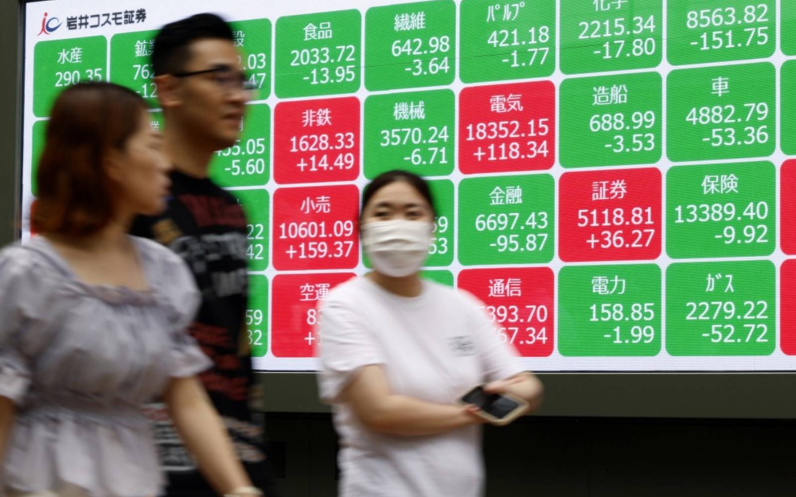 Tech stocks surge on AI optimism as investors await earnings reports