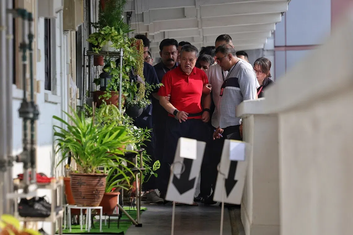 Man accused of Lengkok Bahru murder reconstructs alleged crime scene