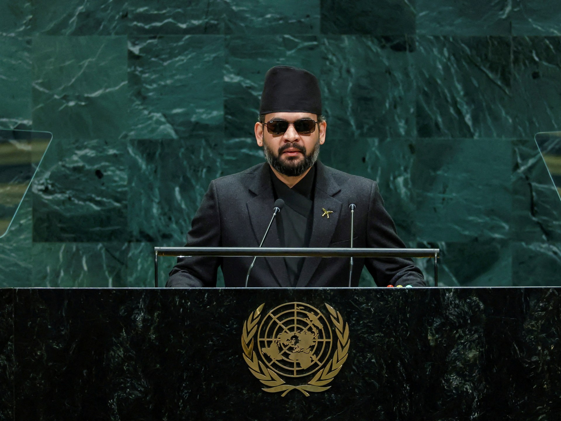 Nepal PM calls devastating floods global climate change wake-up call