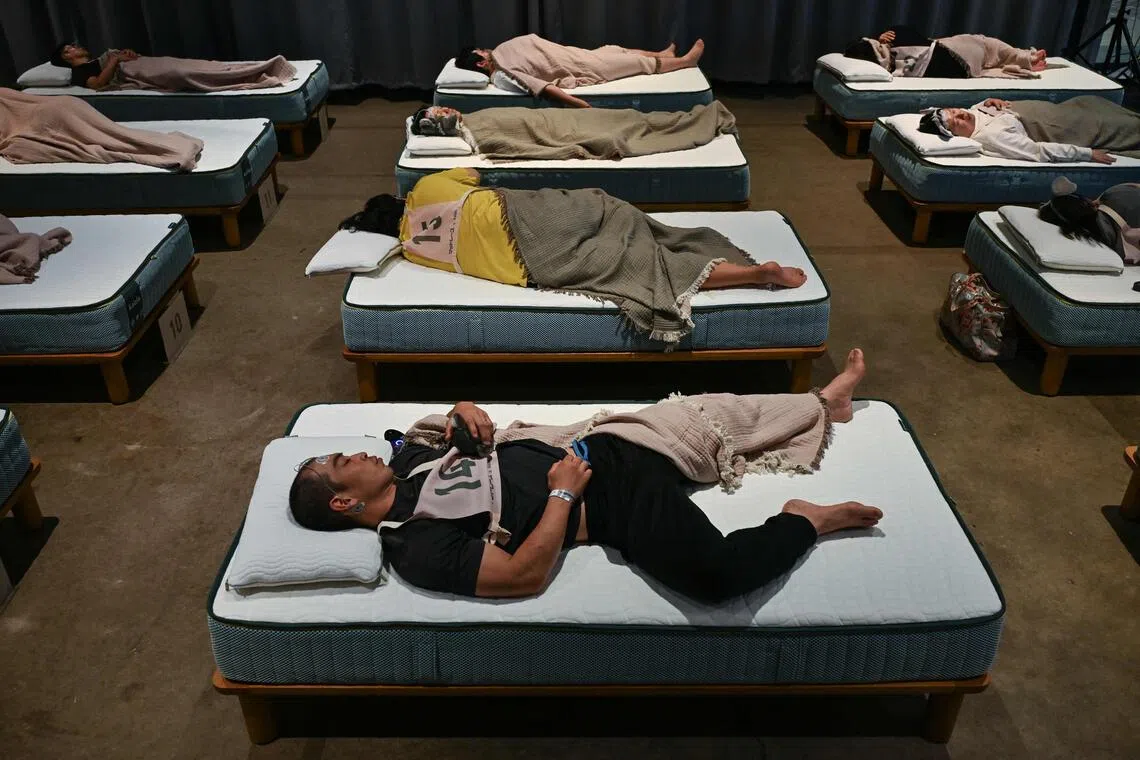 Japanese competitors battle sleep deprivation in unique rest challenge