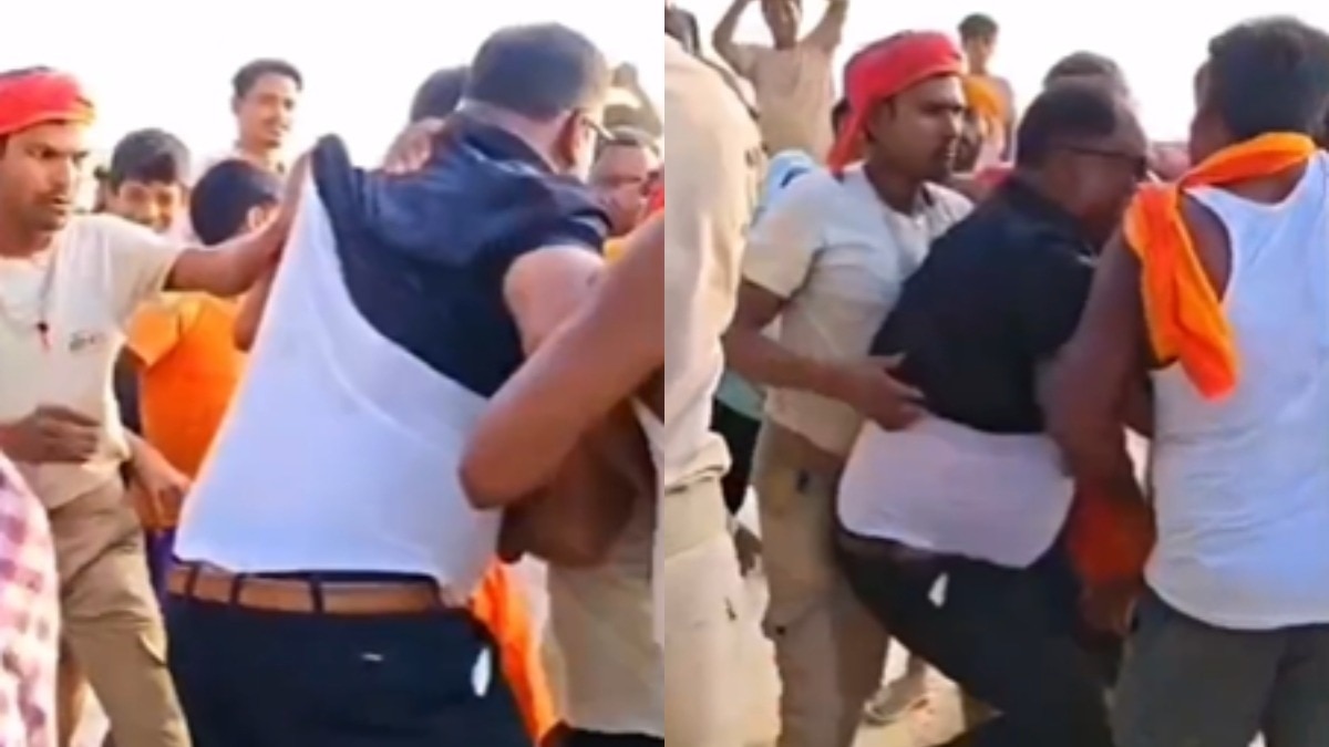 बांध टूटने के बाद भड़के ग्रामीण, अधिकारियों को नदी में डालने का प्रयास