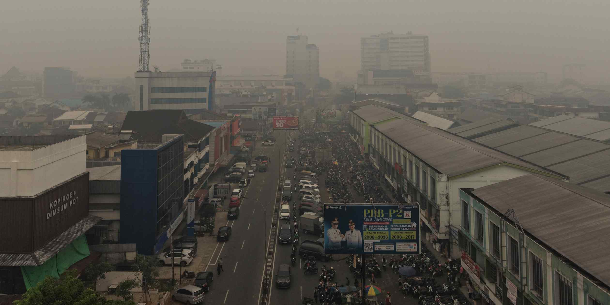 Prolonged wildfires blanket Indonesia's West Kalimantan in thick haze