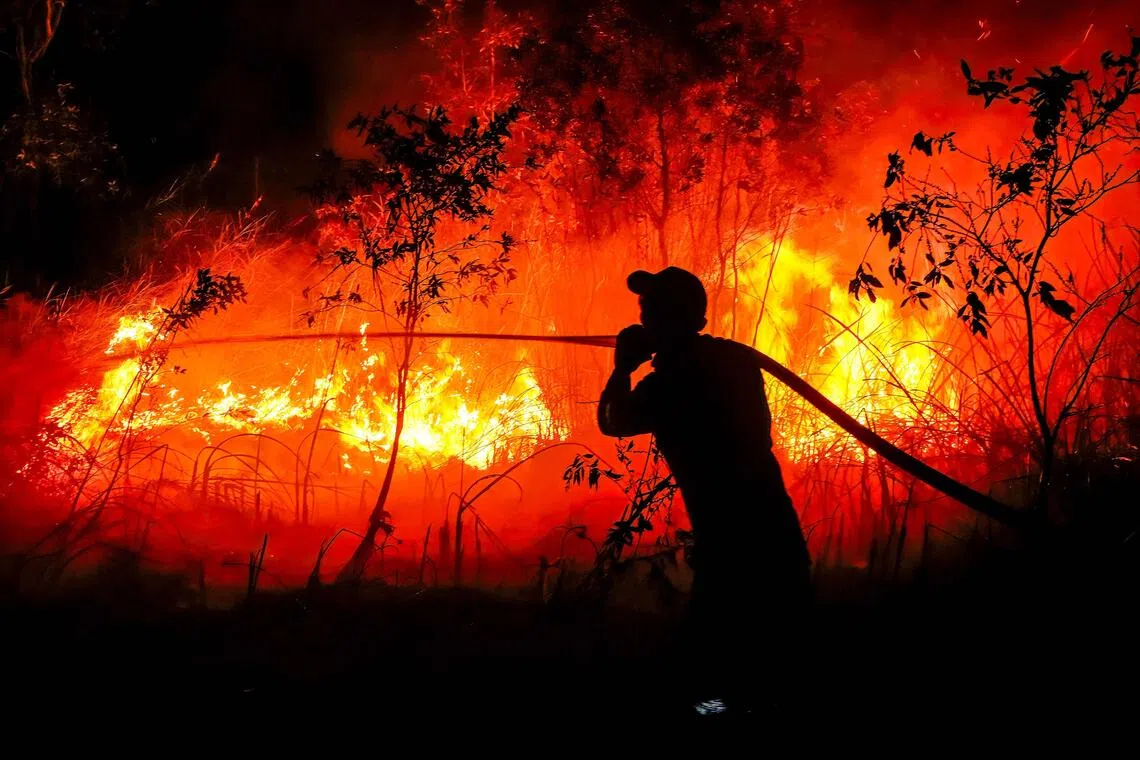 Indonesia deploys massive firefighting effort as blazes persist