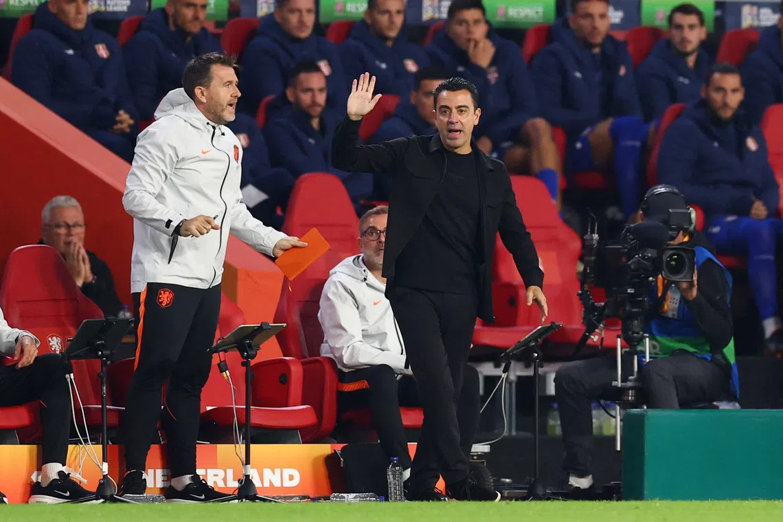 Xavi pleased with Netherlands start, seeks team unity