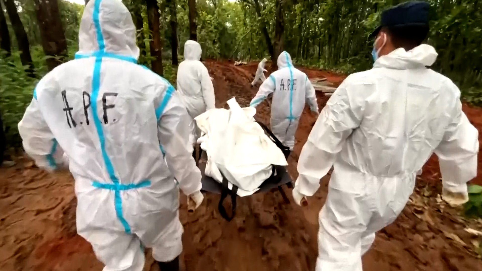 Nepal lays unidentified flood victims to rest as search continues