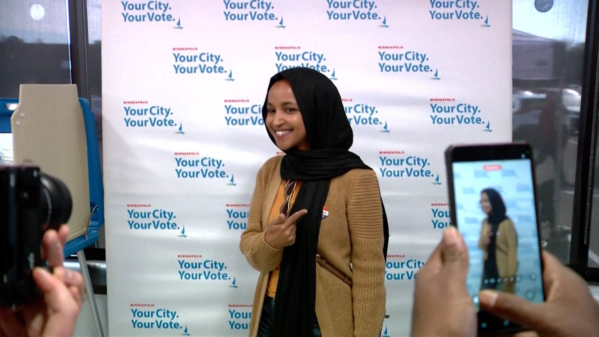 Omar casts ballot as Trump escalates attacks before midterms
