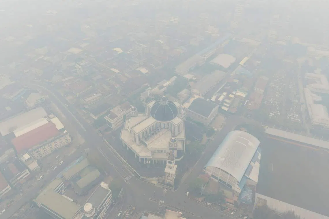 Indonesian wildfires blanket Borneo region in thick haze, smoke reaches Malaysia