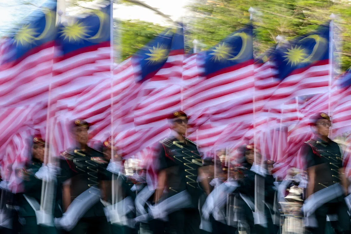 Malaysia opposition parties deepen ties as pressure mounts on PM Anwar