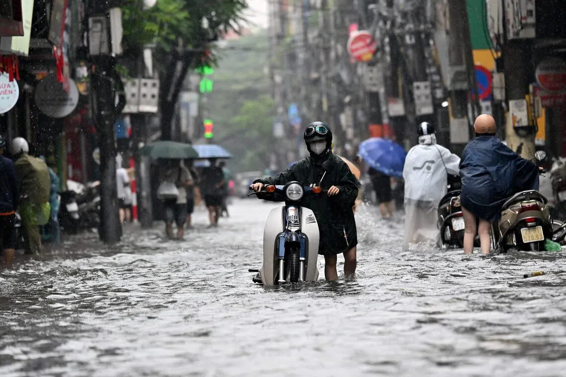 Three dead as torrential rains sweep northern Vietnam
