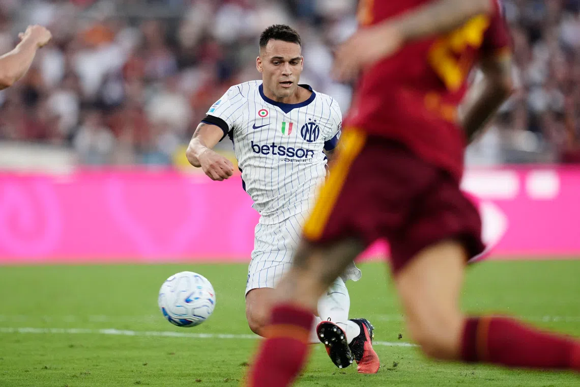 Martinez double keeps unbeaten Inter ahead of Roma in Serie A