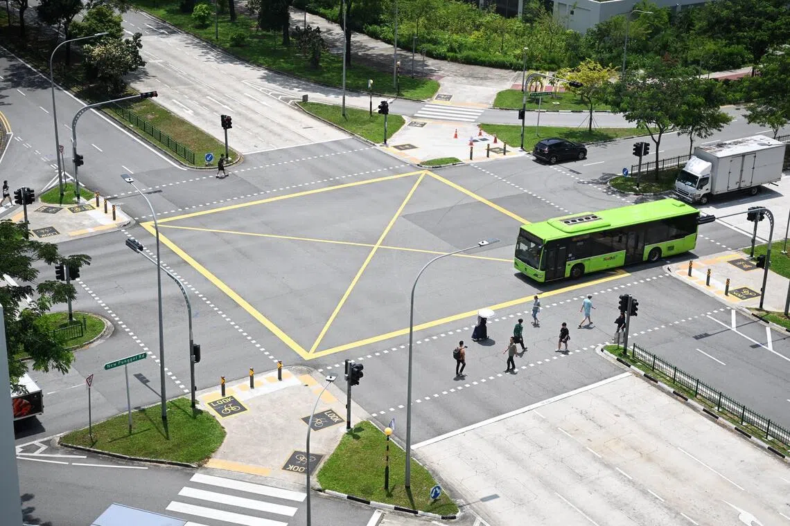 Singapore trials traffic signal assistance for delivery robots in Punggol