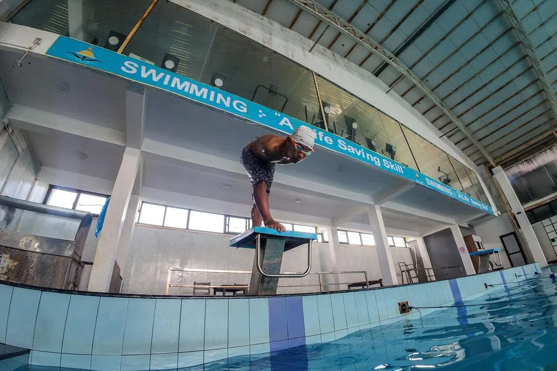 Armless Nepali swimmer powers to Asian success with determination