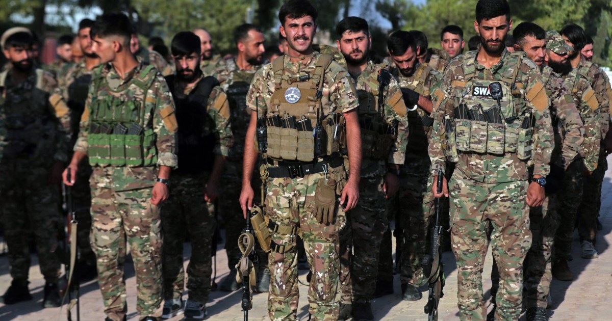 Syrian Kurdish forces integrate with national army after decade of conflict