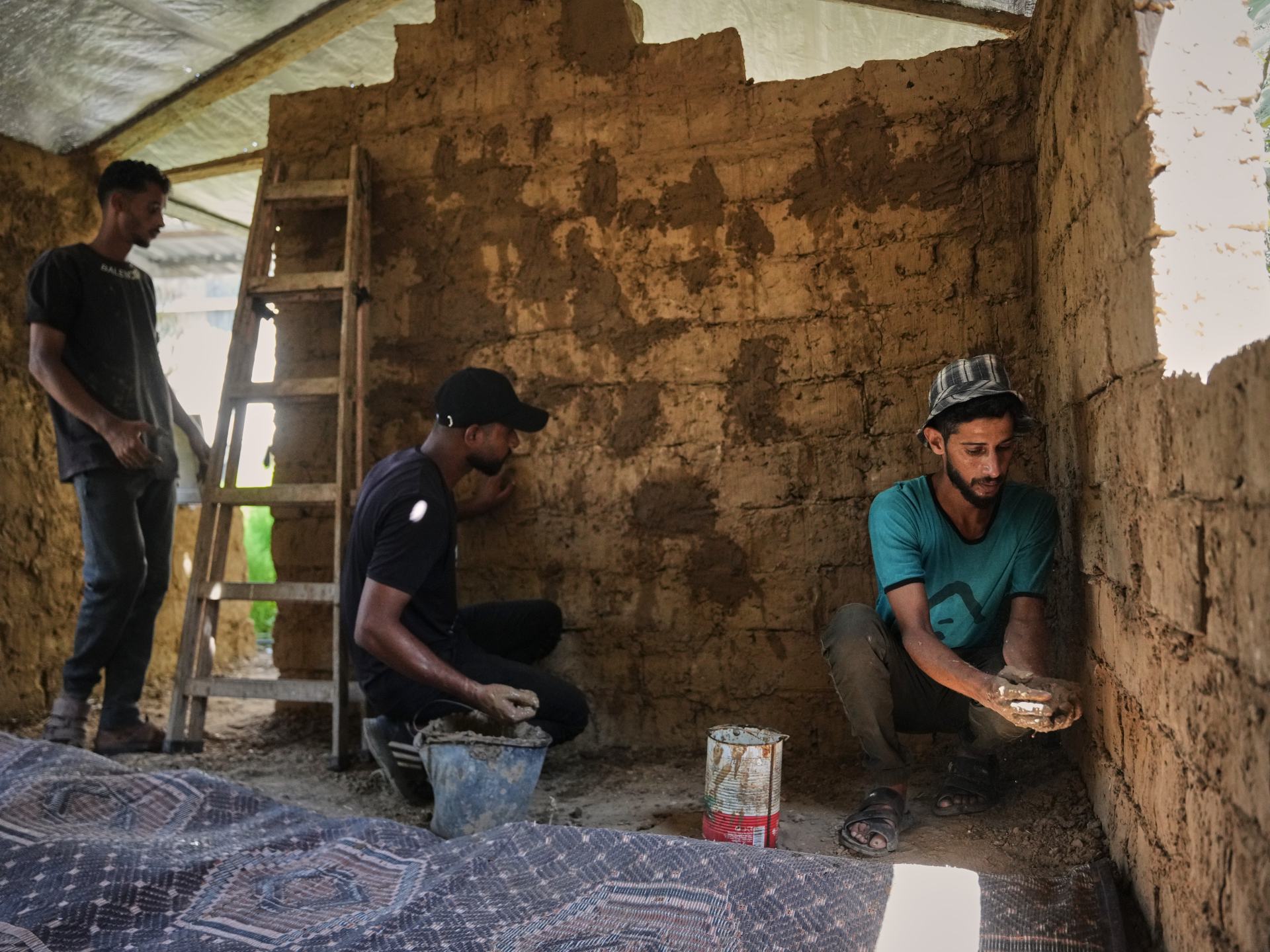 Gazans resort to mud bricks, scrap as reconstruction battle begins