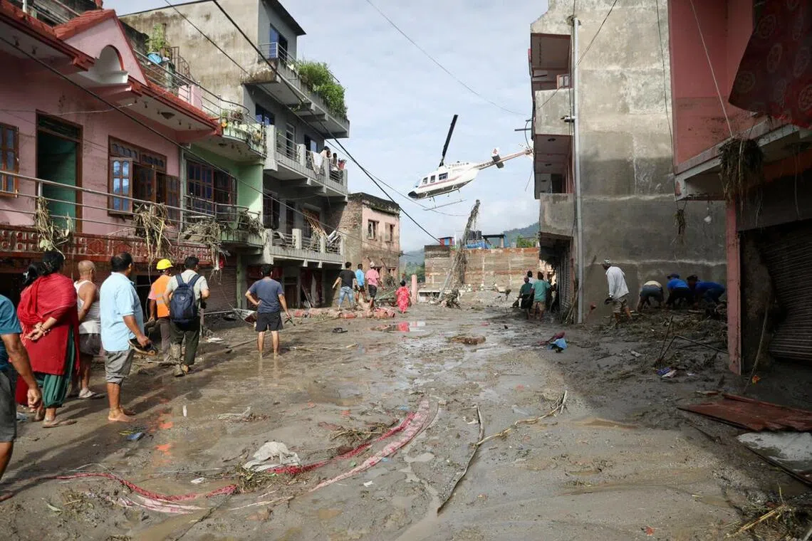 Nearly 100 Chinese unaccounted for after Nepal floods, mudslide