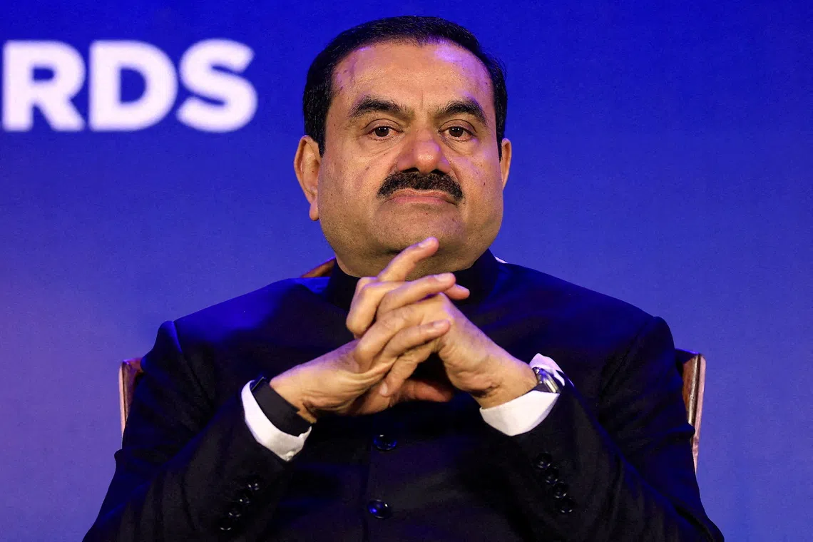 Adani settles long-running shareholding dispute with regulators