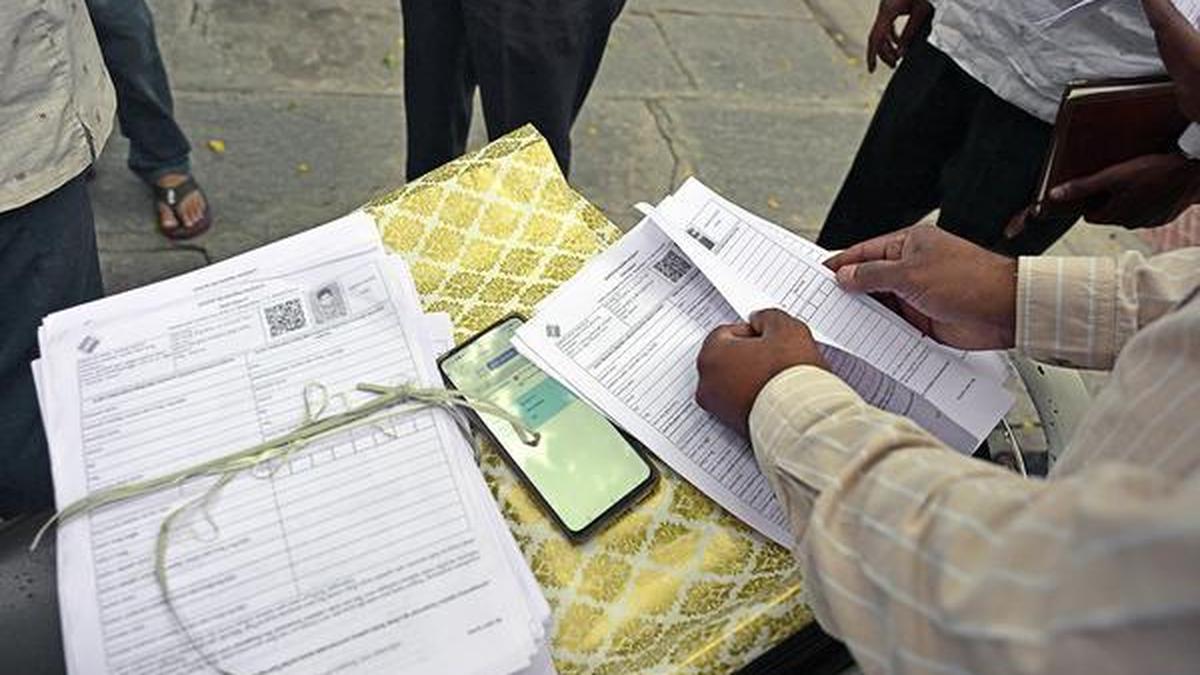 Poll officials shoulder heavy workload as locality-based group hearings begin