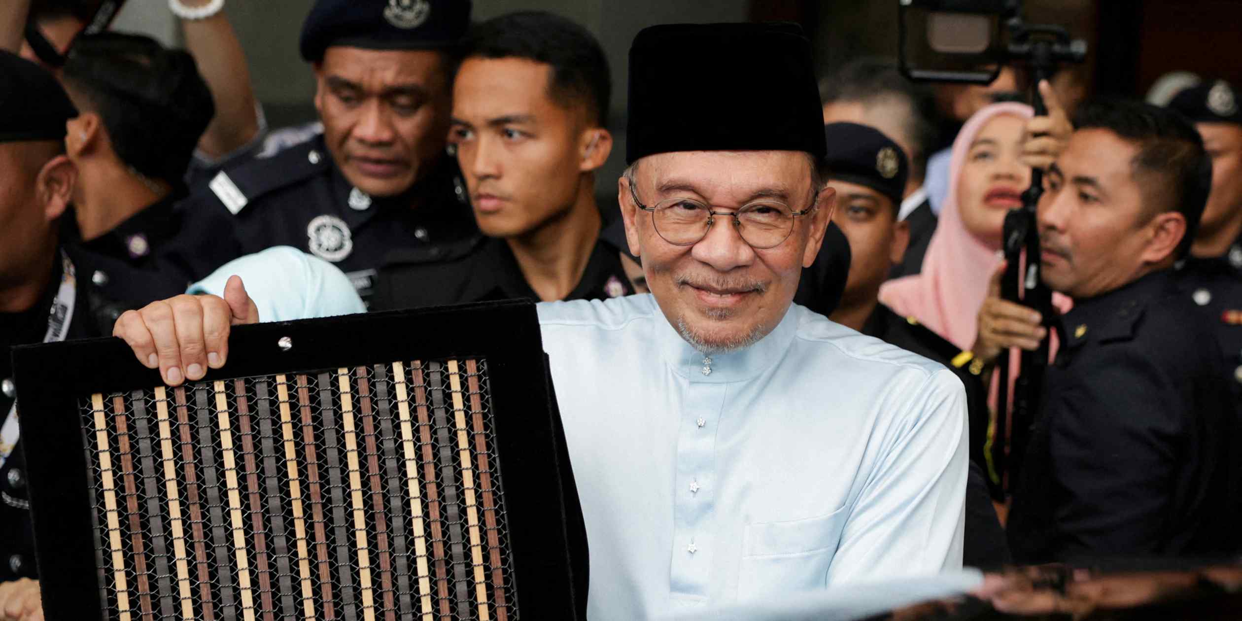 Malaysia announces tax cuts and minimum wage hikes ahead of elections