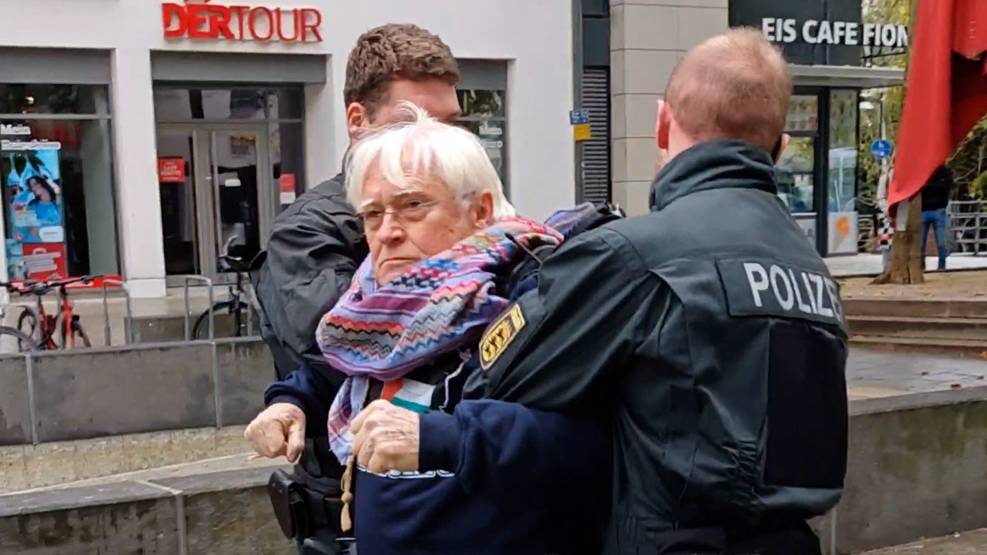 Police detain elderly protester at Elbit Systems demonstration in Germany