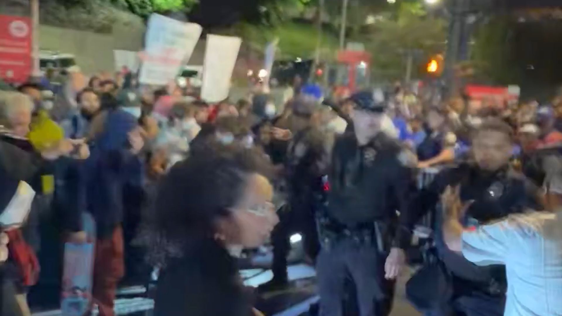 NYPD officers detain politician during immigration enforcement protest