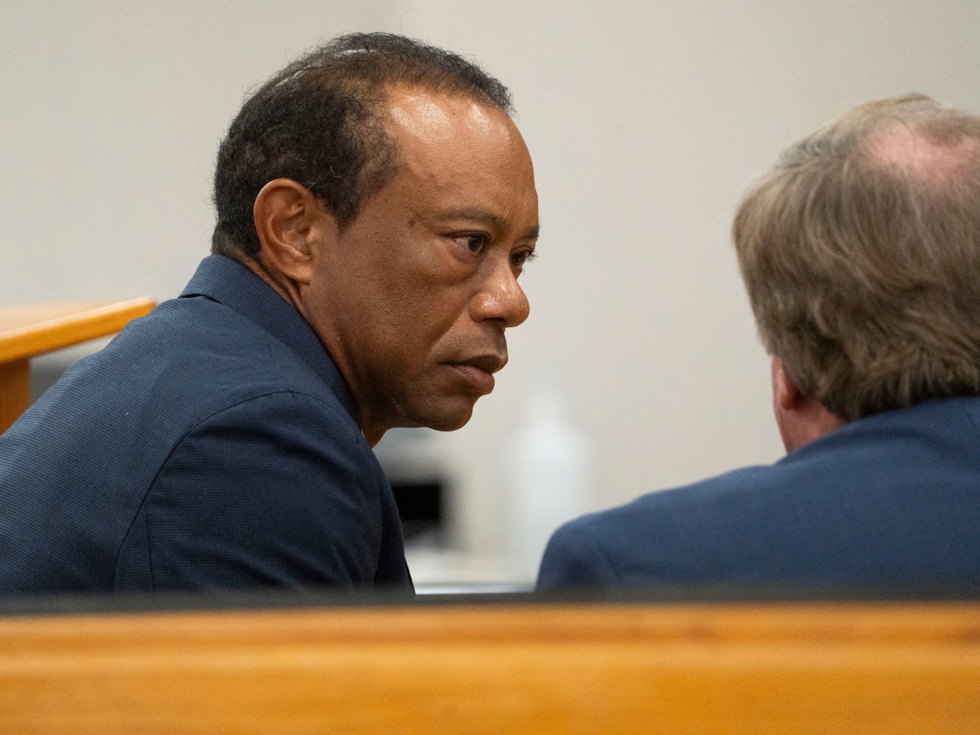 Tiger Woods pleads guilty to reckless driving, loses license for five years