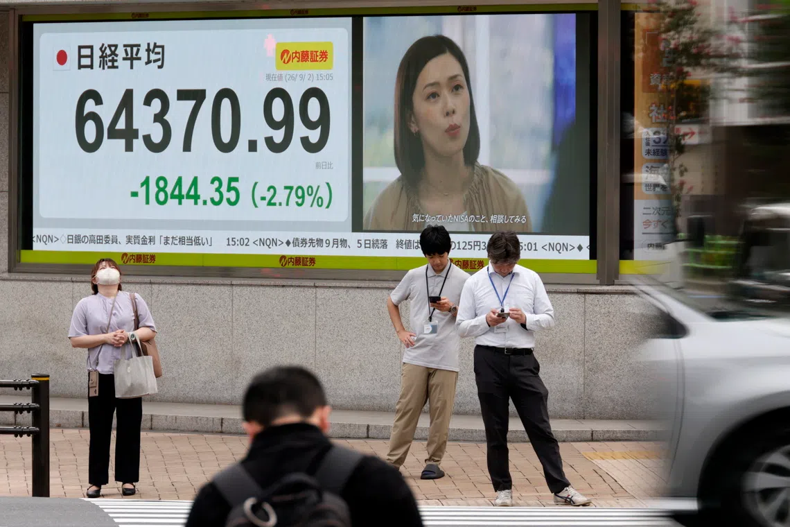 Asian stocks gain ground as investors recalibrate rate expectations