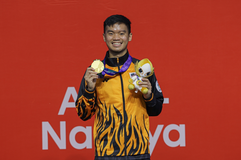 PM Anwar celebrates Ng's Asian Games squash gold, Olympic qualification