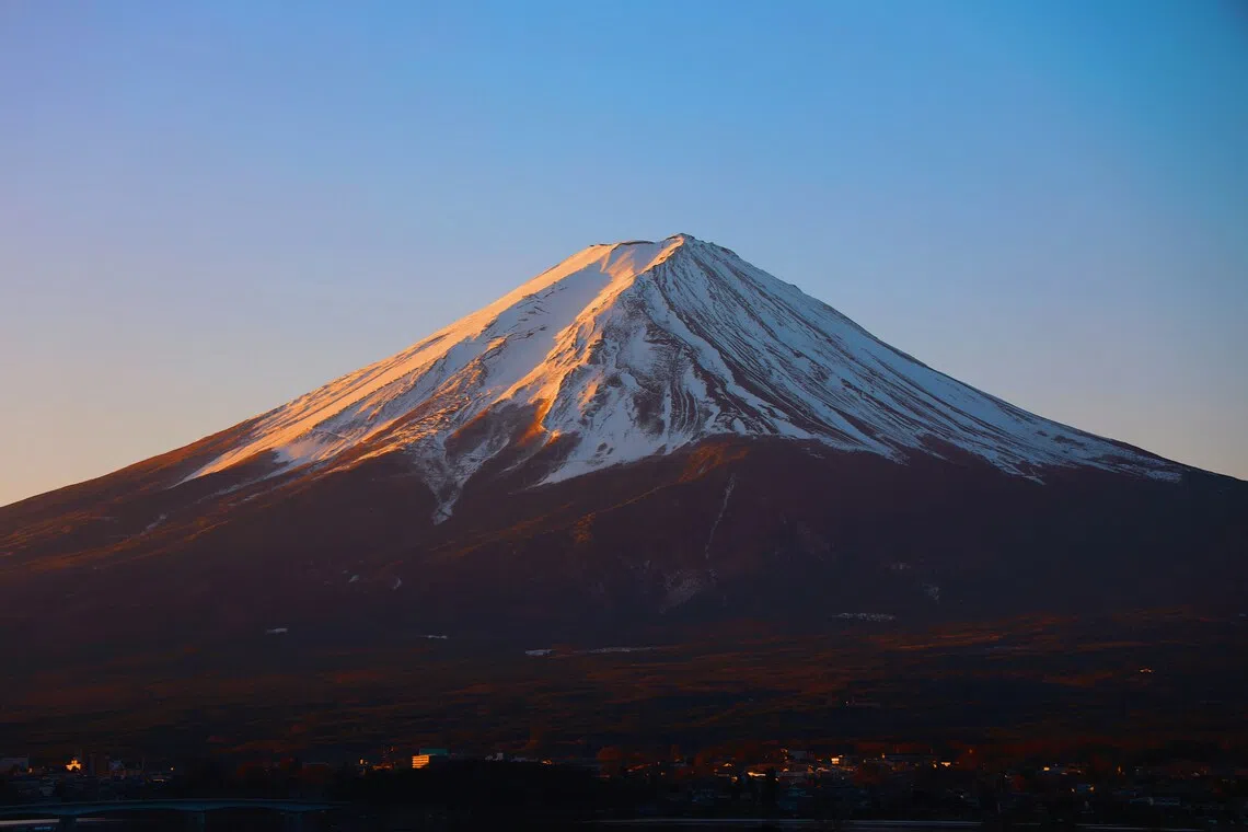 Landslide on Mount Fuji leaves climbers unconscious after heavy downpour