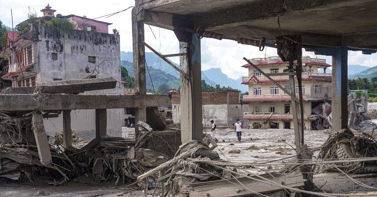 Nepal woman found alive in rubble ten days after devastating floods