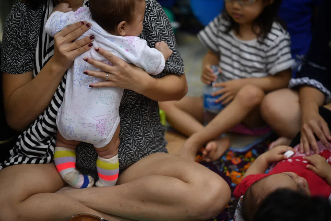 Singapore shifts approach to parenthood support over birth incentives