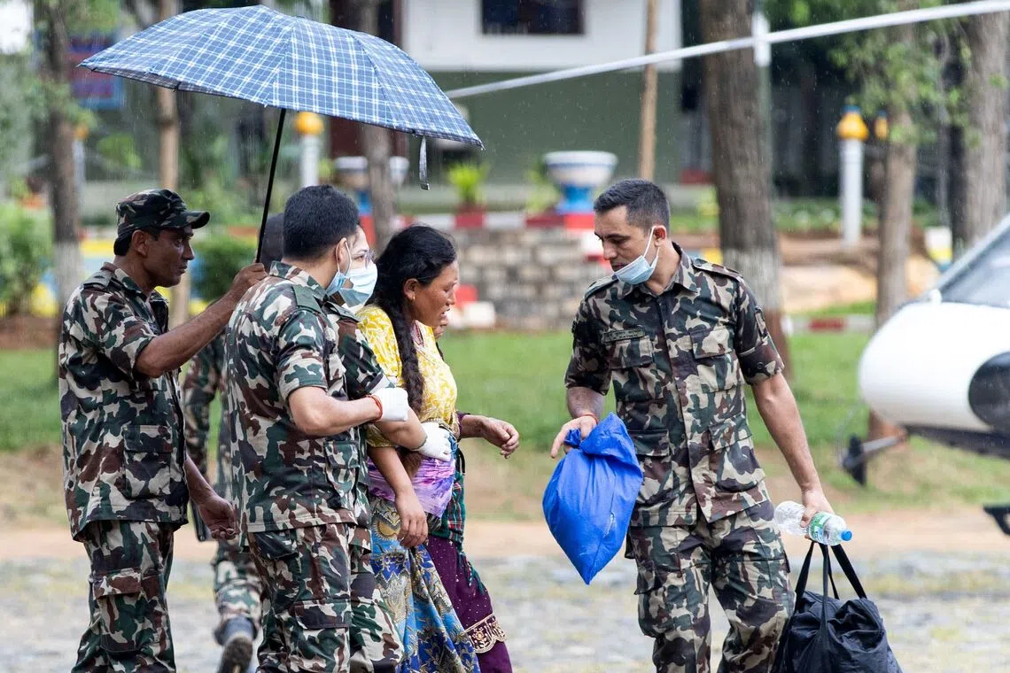 Over 2,400 missing after devastating floods sweep Nepal and China