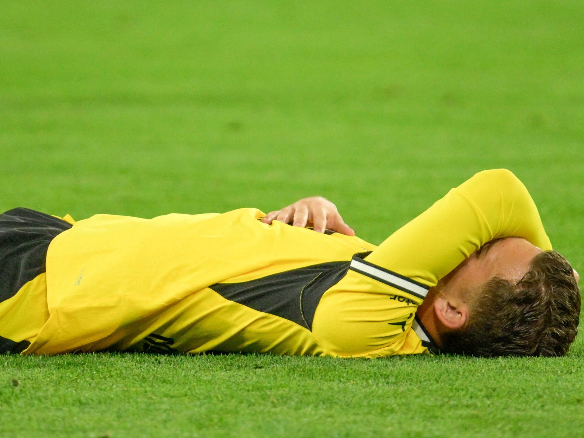 Borussia Dortmund's Karetsas hospitalised after Champions League collapse