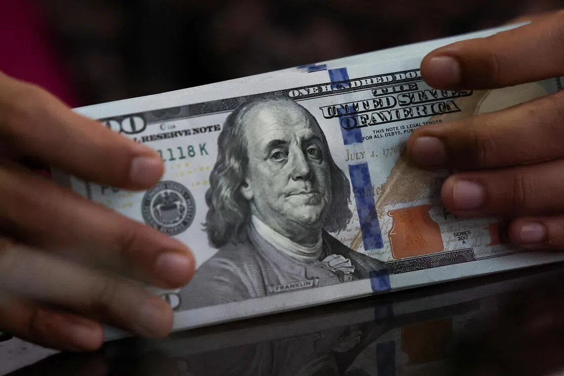 Dollar surges to 17-month peak as global bond selloff intensifies