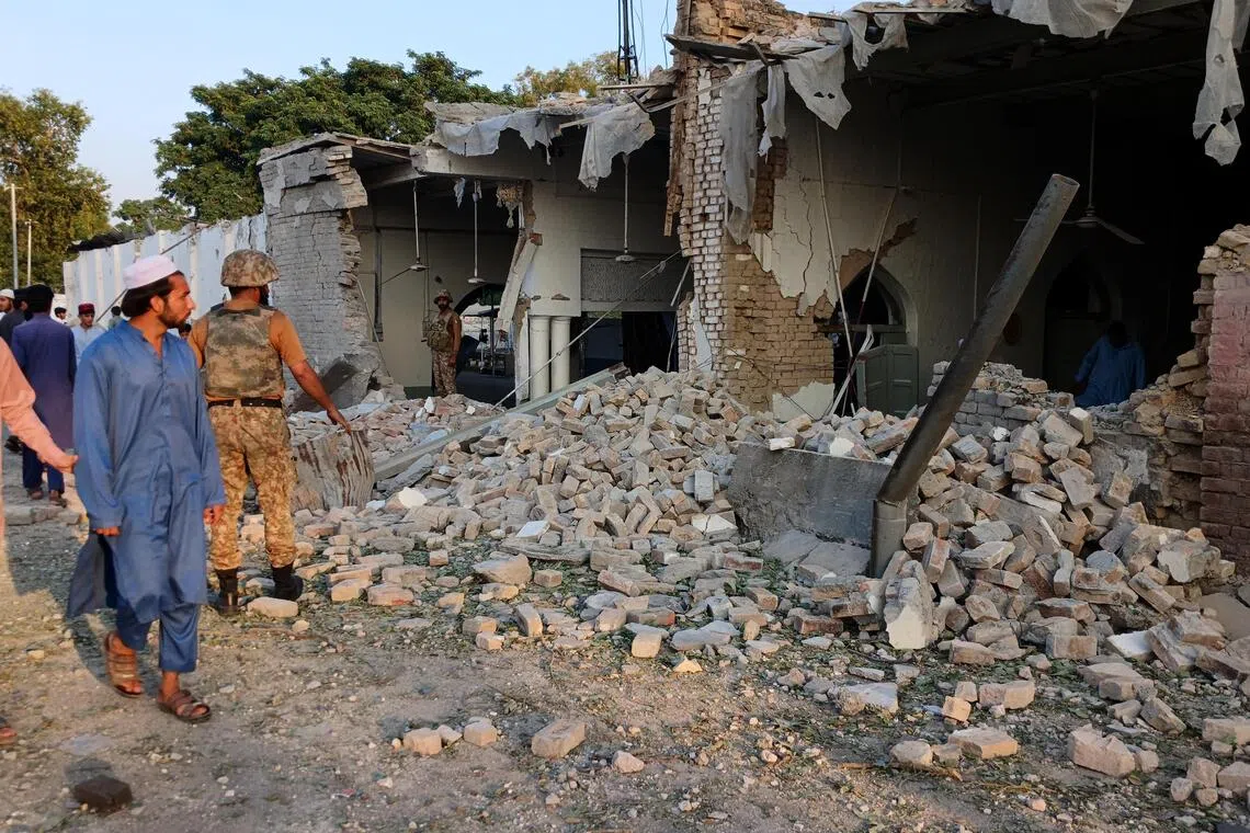 Death toll climbs to 31 in Pakistan police headquarters attack