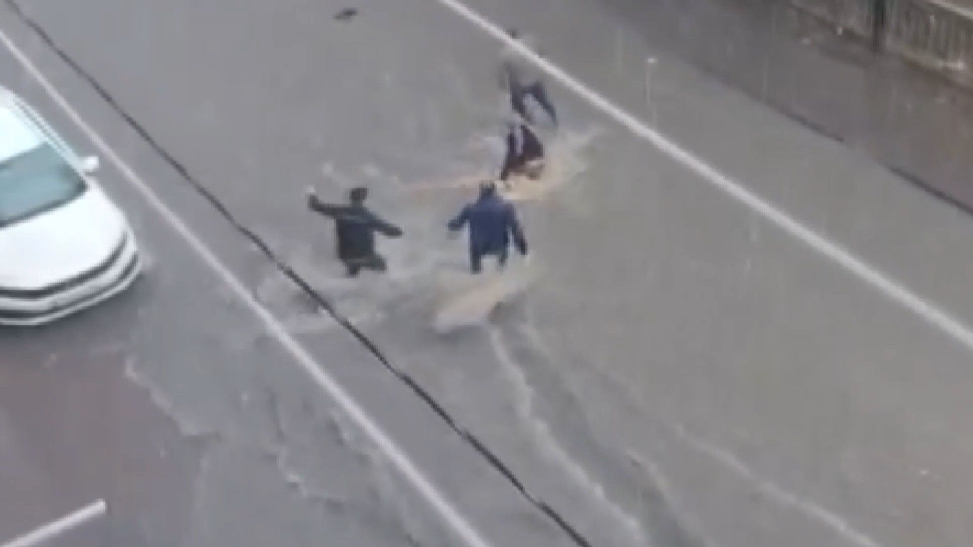 Woman pulled to safety after being swept away in Istanbul flash flood