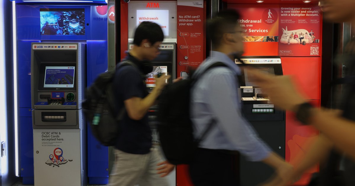 Singapore's big three banks slide deeper into red