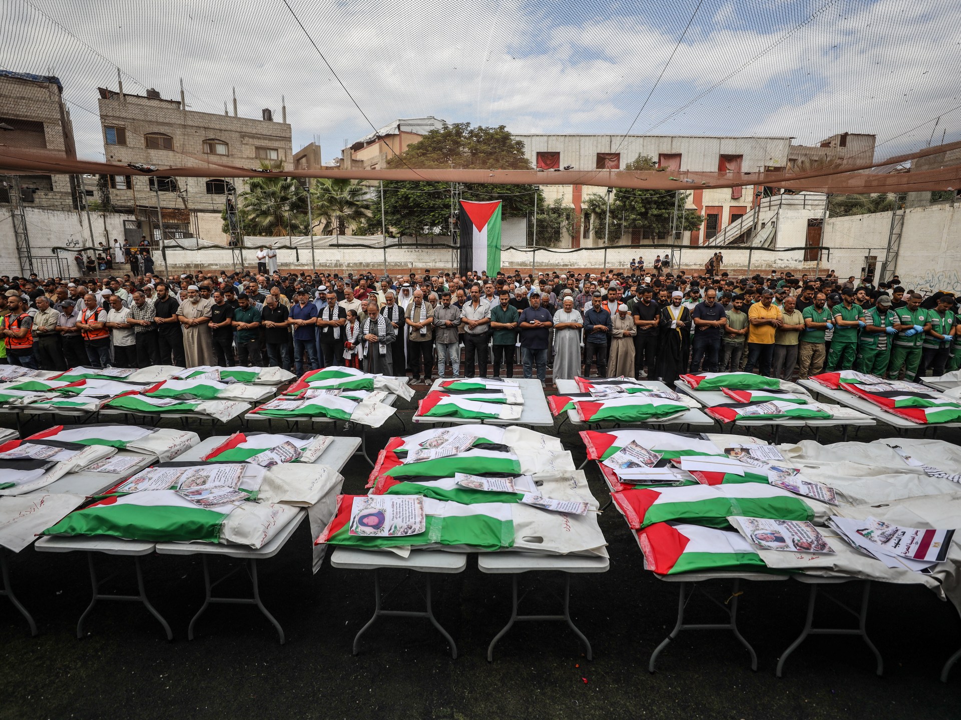 Gaza holds funeral services for 75 Palestinians recovered from rubble