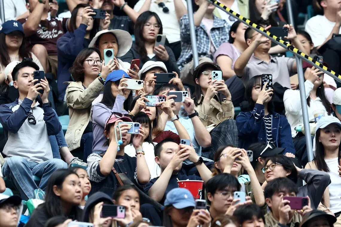 Zheng Qinwen takes crowd to task at China Open despite advancing