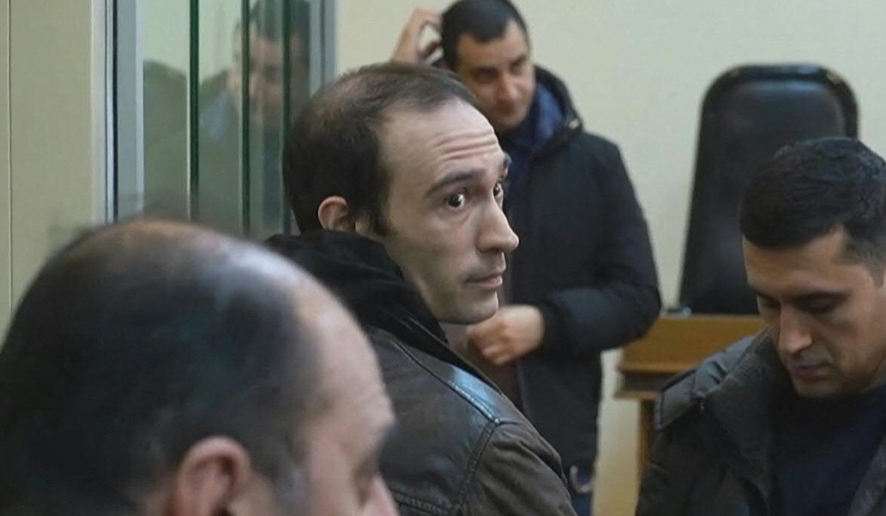 Azerbaijan pardons French spy convict as EU eases oligarch sanctions